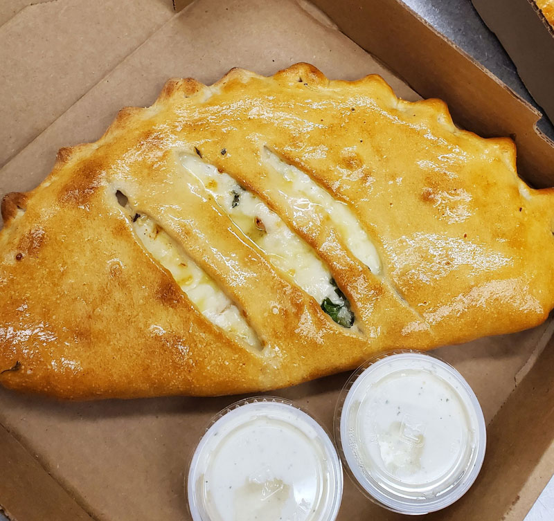Calzone with sauces
