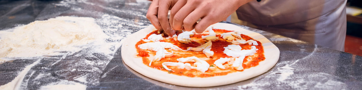 Pizza being made